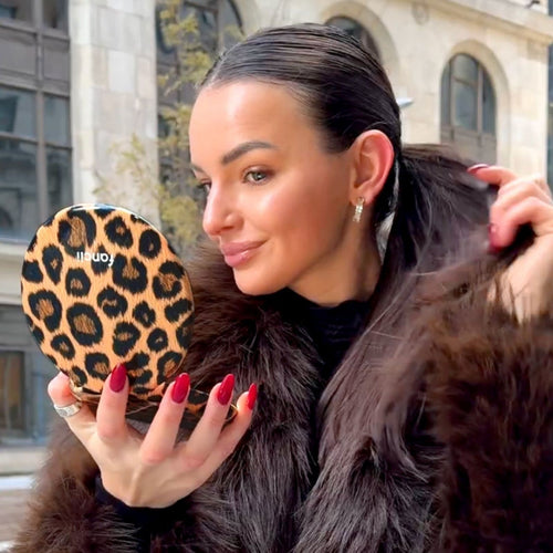 Taylor Lighted Compact in Cheetah Chic open and lighting model's face