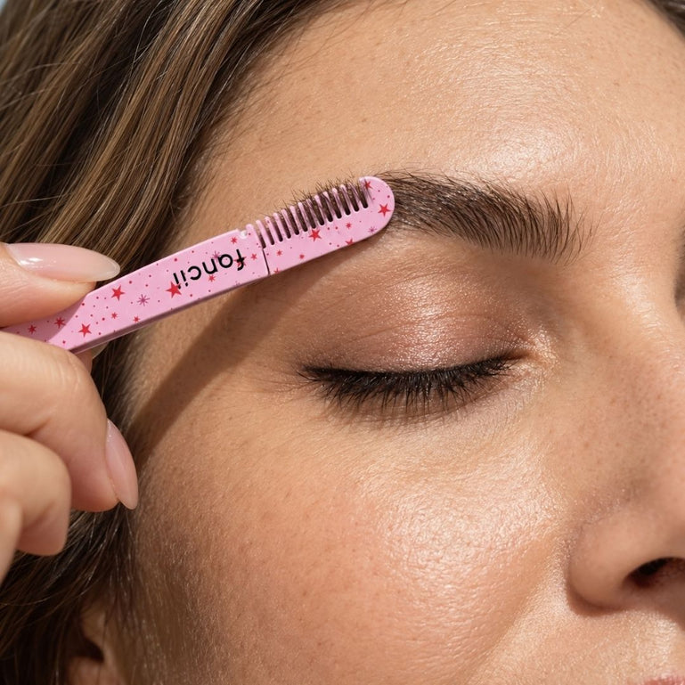 Tessa Tweezer Set from Fancii & Co. Brush end used to groom eyebrows
