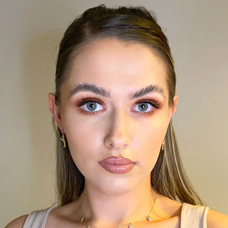 Fancii Light Showcasing Even, Natural Light and a Model with Great Makeup